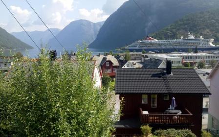 Cruise ship docked at the port of Hellesylt, Norway