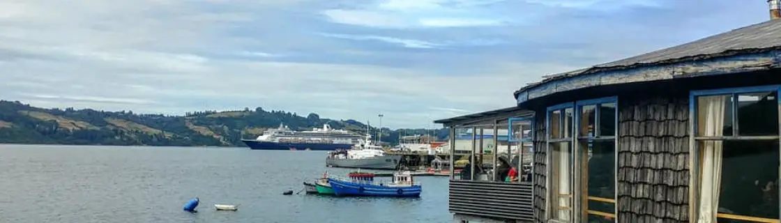 cruise ship docked at the port of Castro, Chile