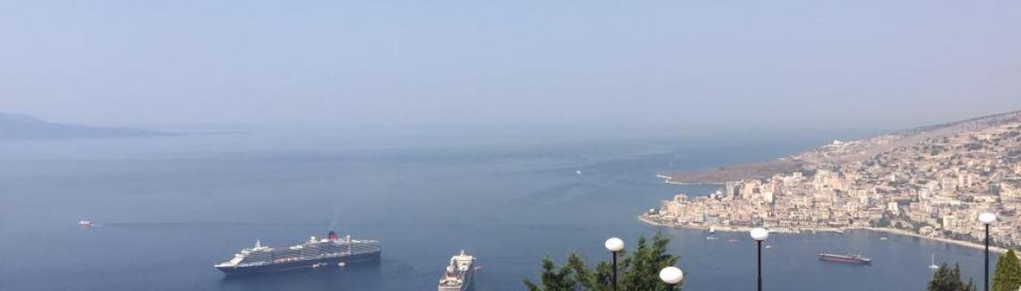 cruise ship docked at the port of Sarande, Albania