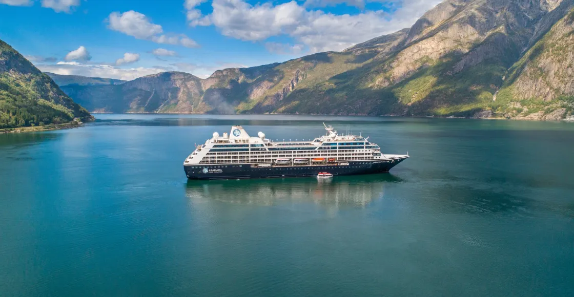 Azamara Pursuit cruise ship at anchor near port