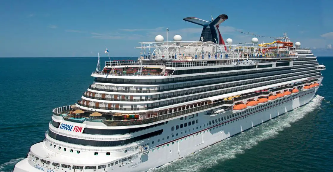 Carnival Vista cruise ship sailing from home port aerial view