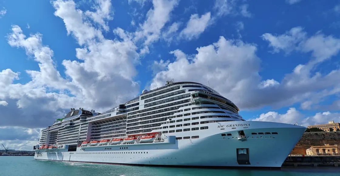 MSC Cruises Grandiosa cruise ship sailing to homeport